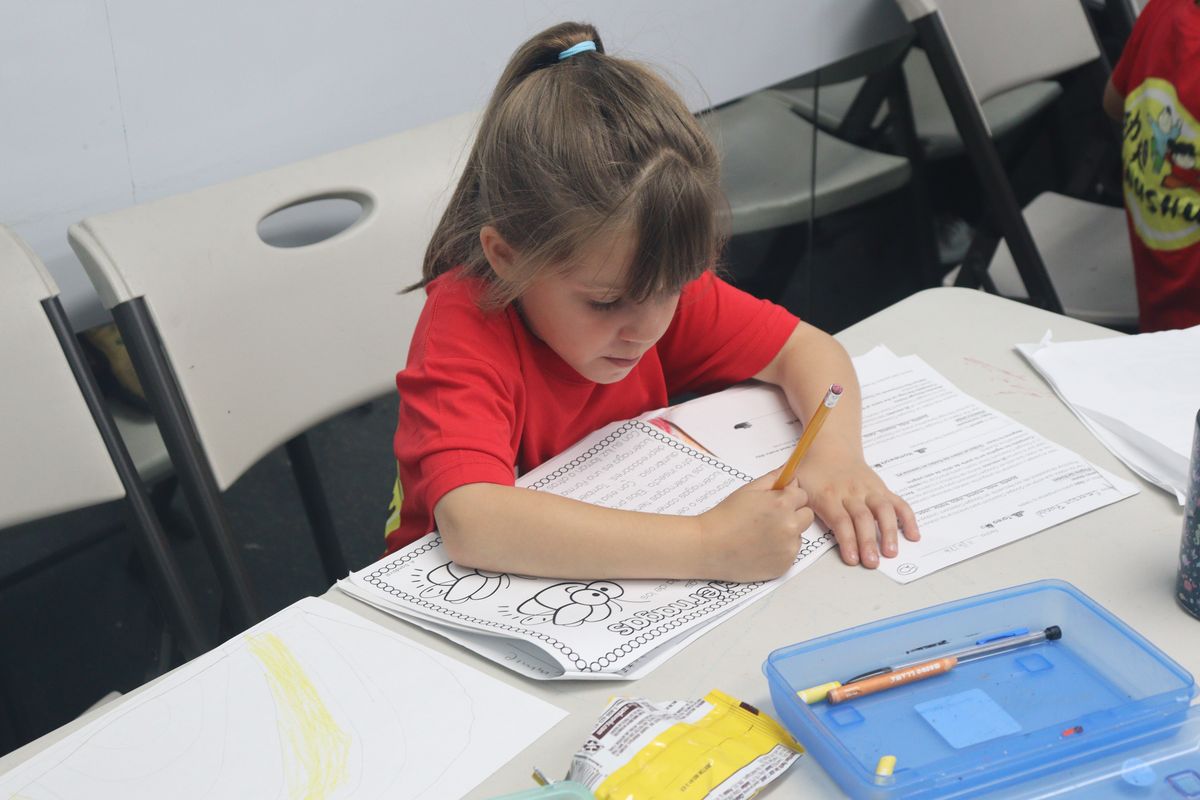 A student working at a desk during the After School Program